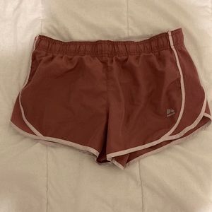 small RBX pink athletic shorts with inside liner and pocket
